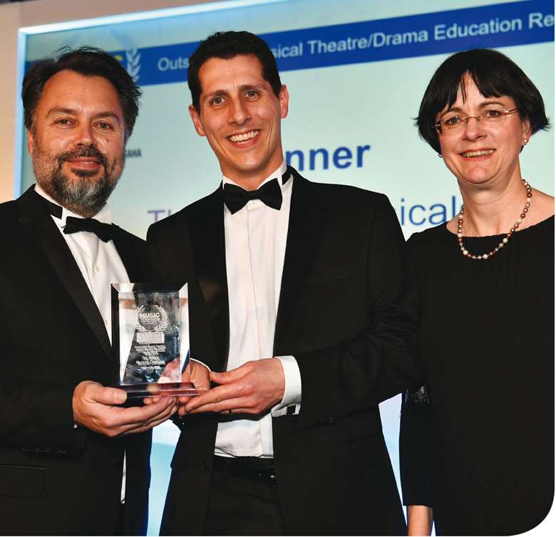 Matthew (left) and Tom (centre) celebrate winning a Music Teacher Award for Excellence
