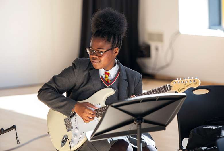 A student practising as part of the Orchestrate project 
