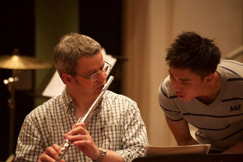 Conrad Marshall working with an emerging composers on the Composing For ... programme