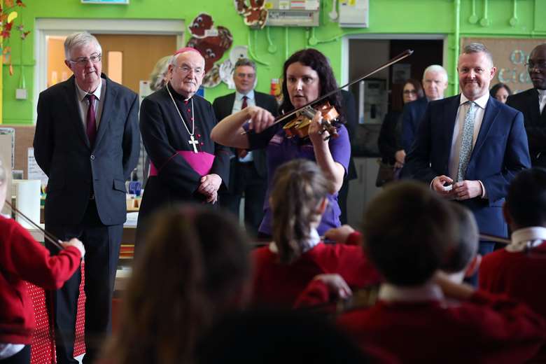 Mark Drakeford and Jeremy Miles at St Joseph's Cathedral Primary School in Swansea