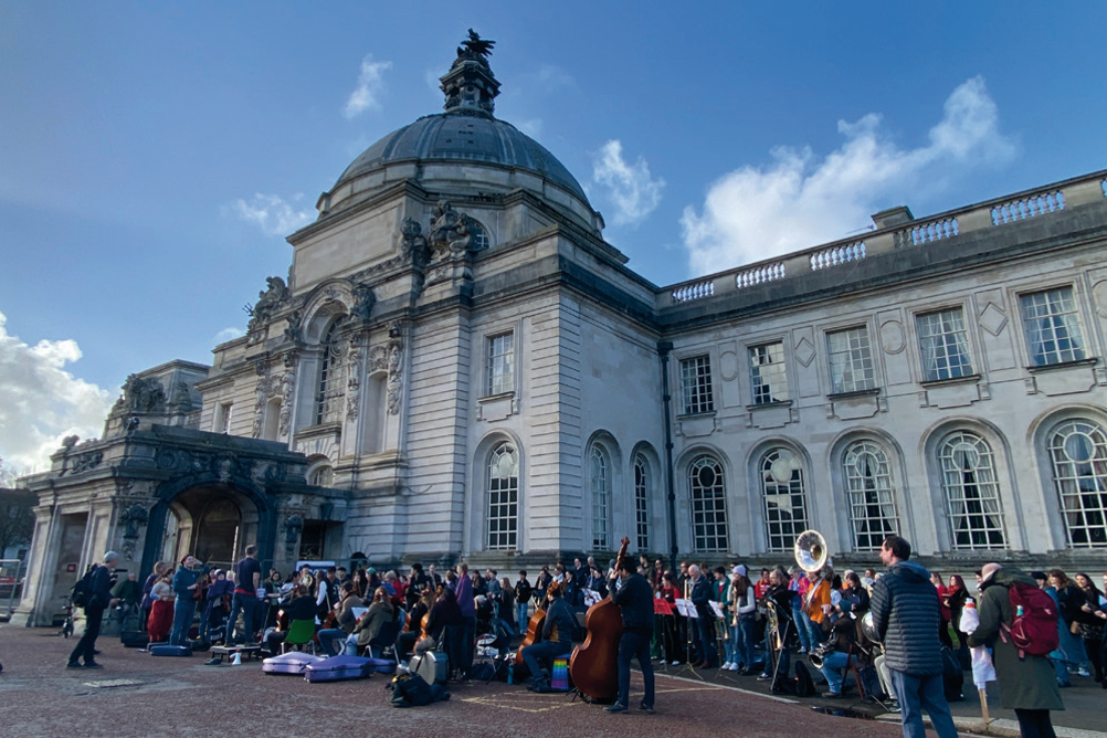 Demonstrators against the closure of Cardiff University's School of Music gather for a musical protest on 22 February