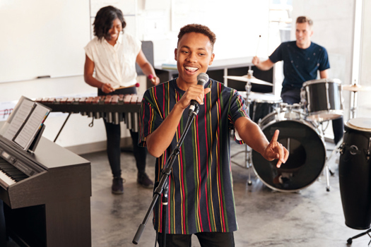 Forming bands to perform favourite songs offers a progression pathway for informal learning