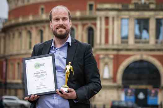 Nathaniel Dye with his ISM Lifetime Achievement Award