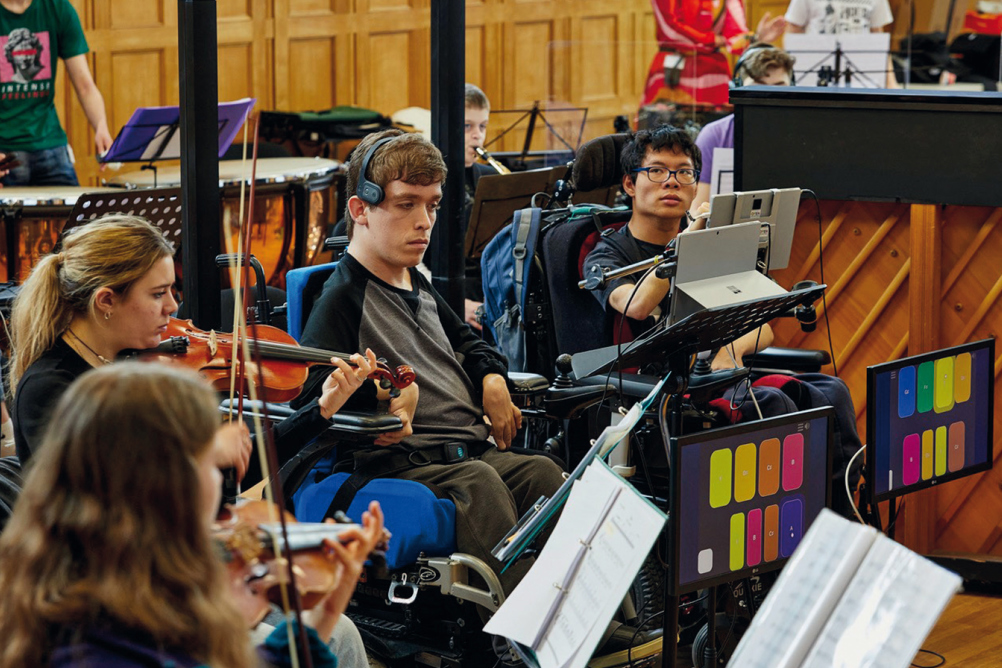 The National Open Youth Orchestra (NOYO), with Clarion musician Alessandro Vazzana (centre)